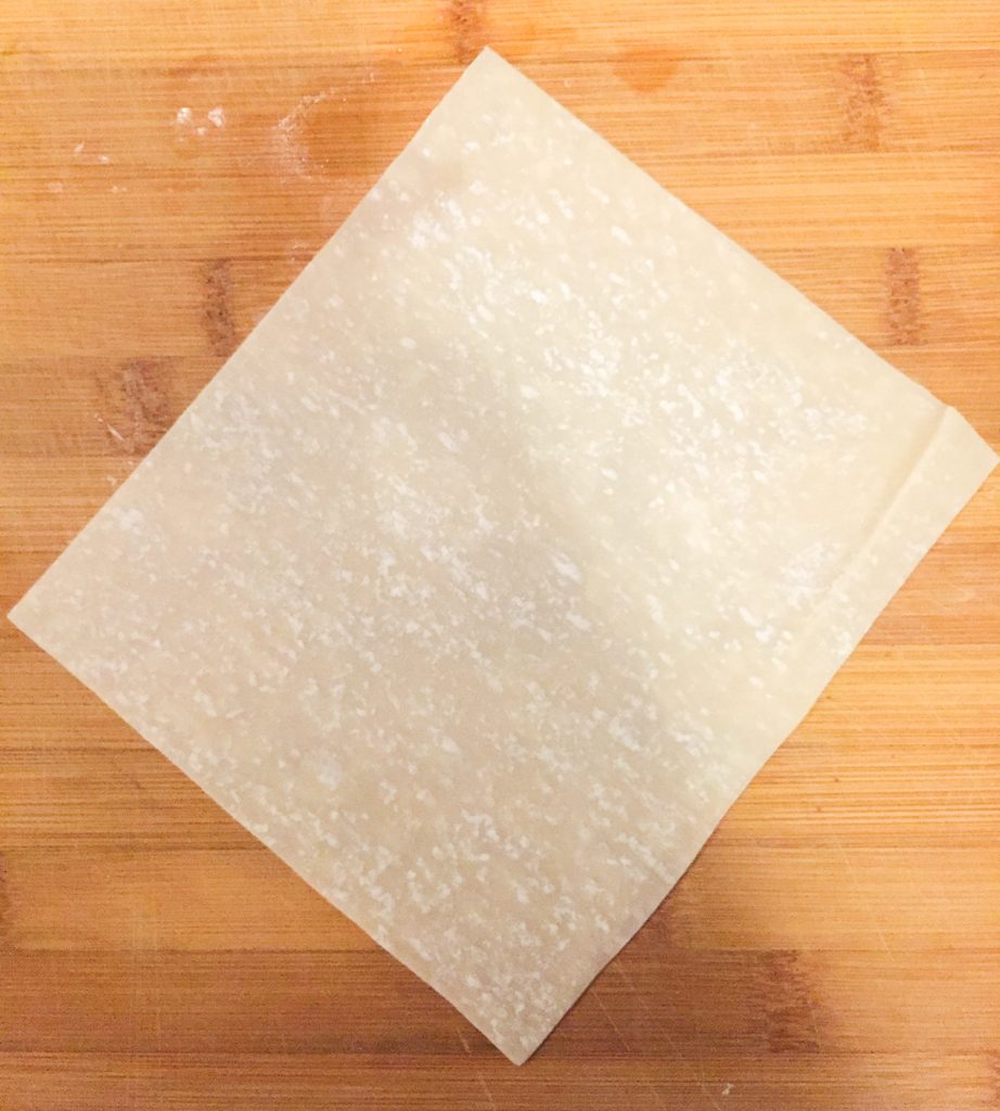 how-to-make-ackee-and-saltfish-springrolls-step-1-lay-out-a-egg-roll-wrapper-flat-on-your-cutting-board